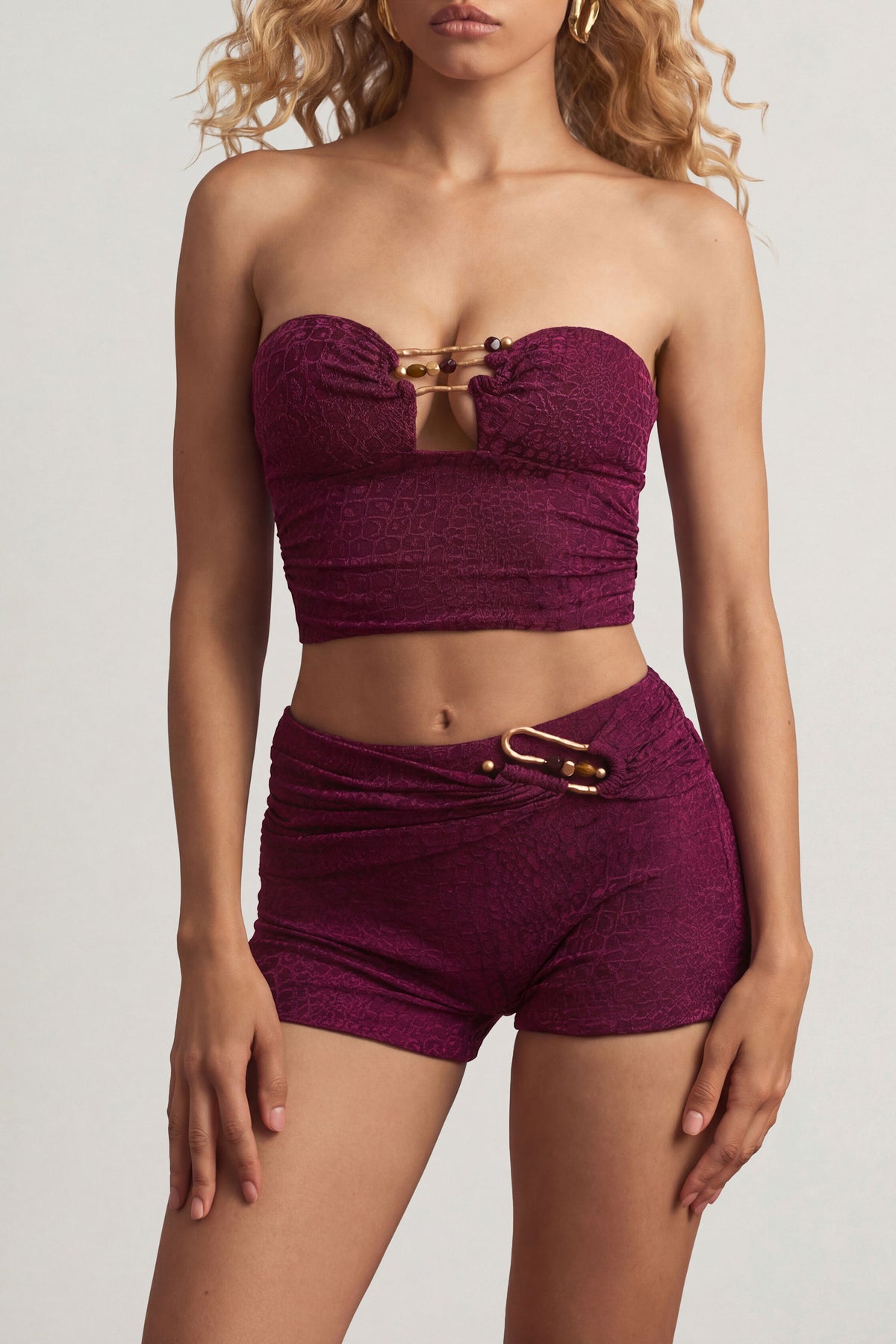 ⁣⁢Bandeau-Crop-Top mit Hardware-Details in Mulberry⁤⁣