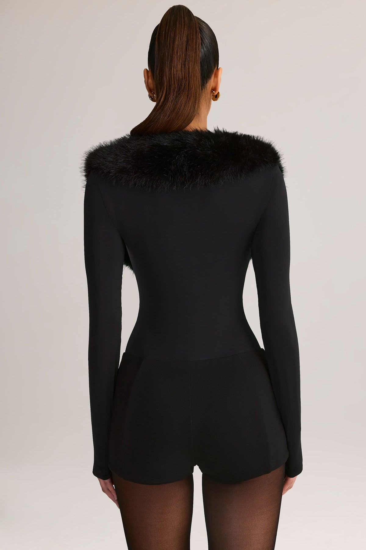 ⁣⁢Jumpsuit mit Korsett-Detail und Kunstpelzbesatz in Schwarz⁤⁣