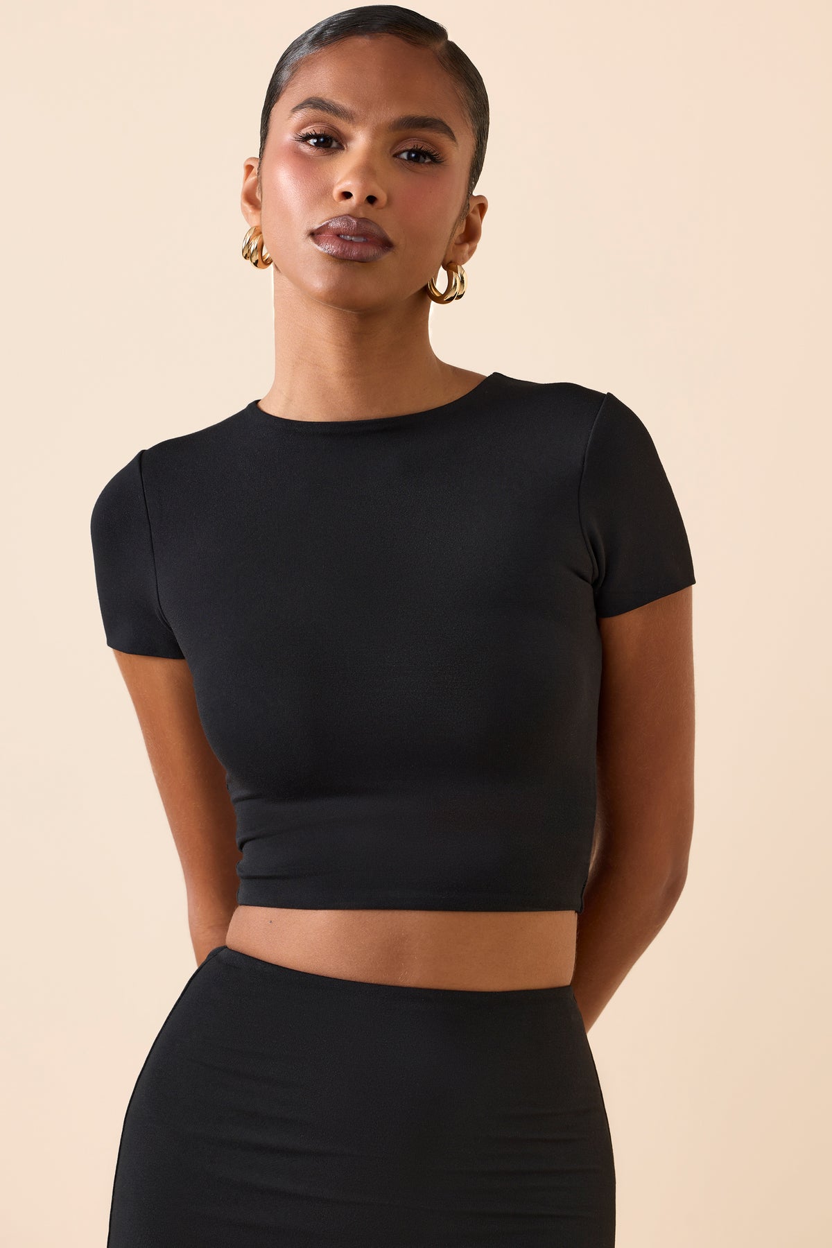⁣⁢Crop-Top mit Kappärmeln in Schwarz⁤⁣