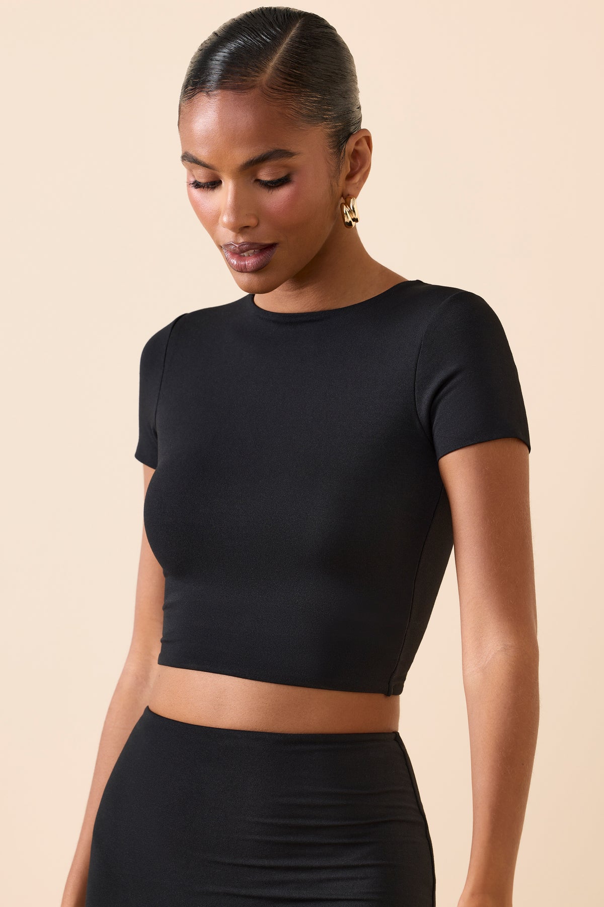 ⁣⁢Crop-Top mit Kappärmeln in Schwarz⁤⁣