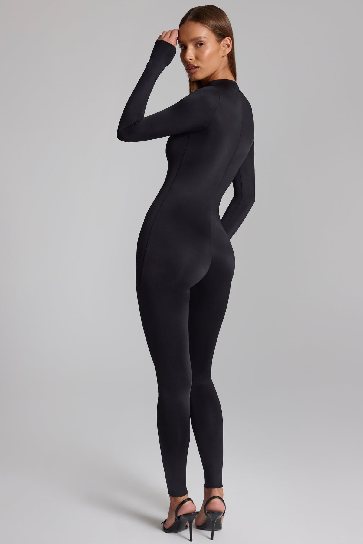 ⁣⁢Hochgeschlossener, langärmliger Overall in Schwarz⁤⁣