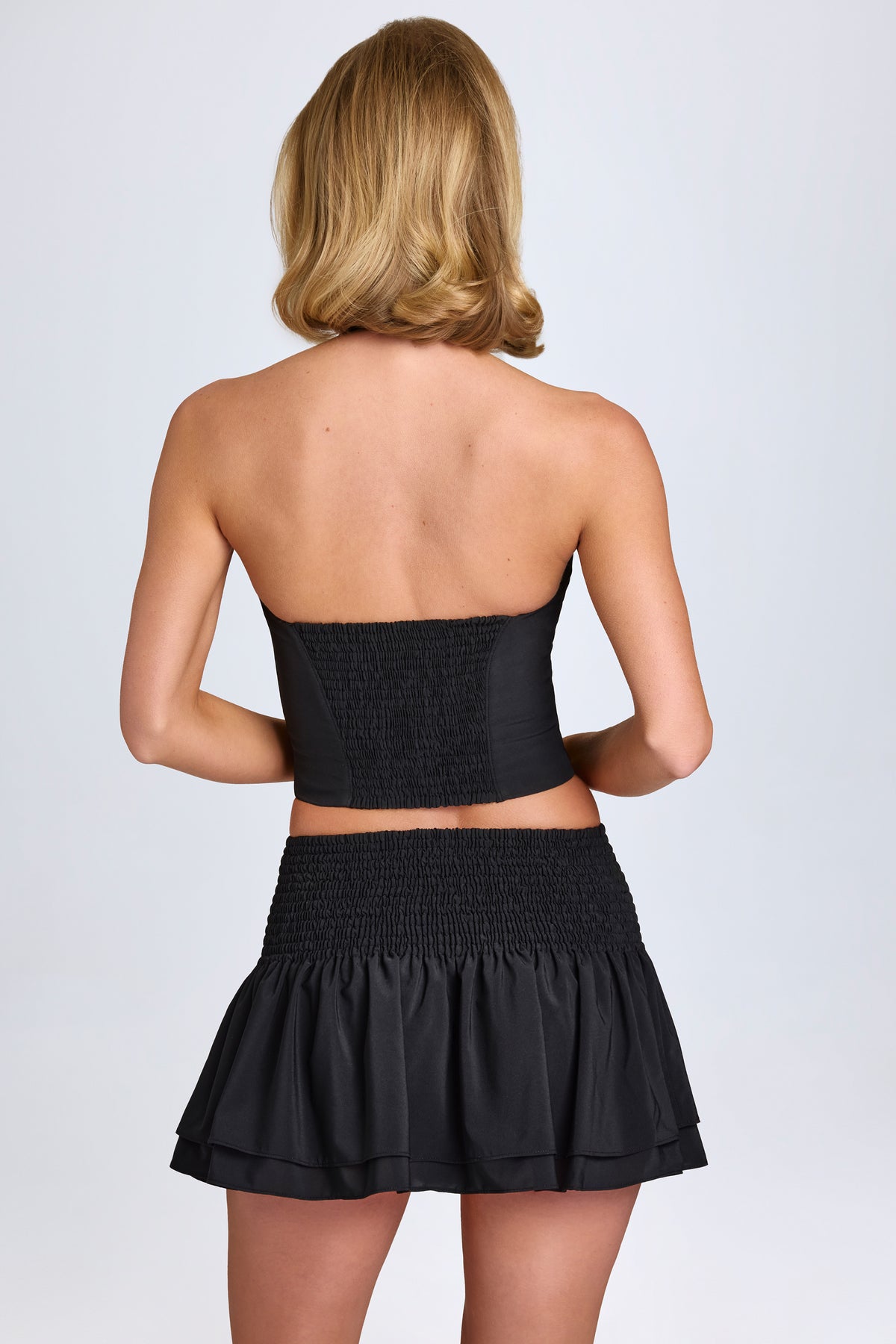 ⁣⁢Gerüschter Shirred Micro-Minirock mit tiefem Bund in Schwarz⁤⁣
