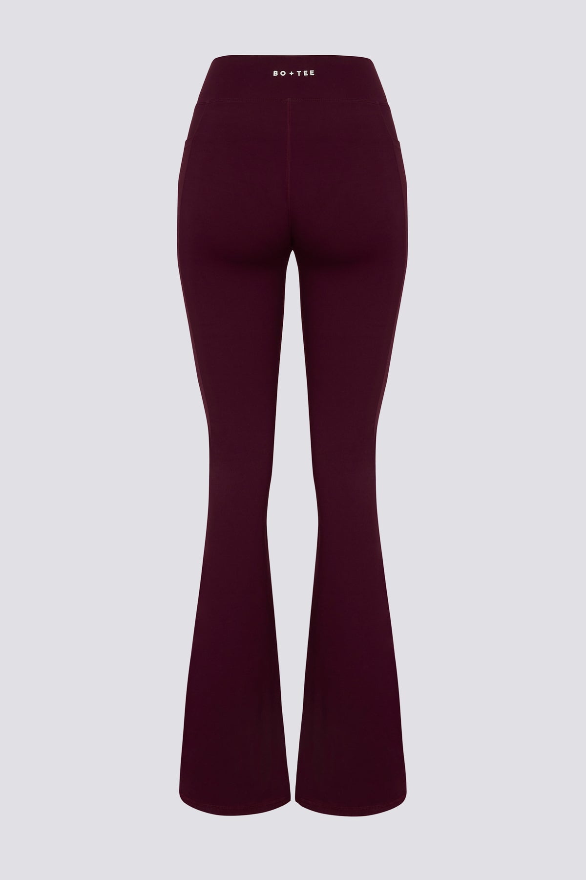 ⁣⁢Soft Active Flared-Leggings mit V-Bund und Taschen in Bordeaux⁤⁣