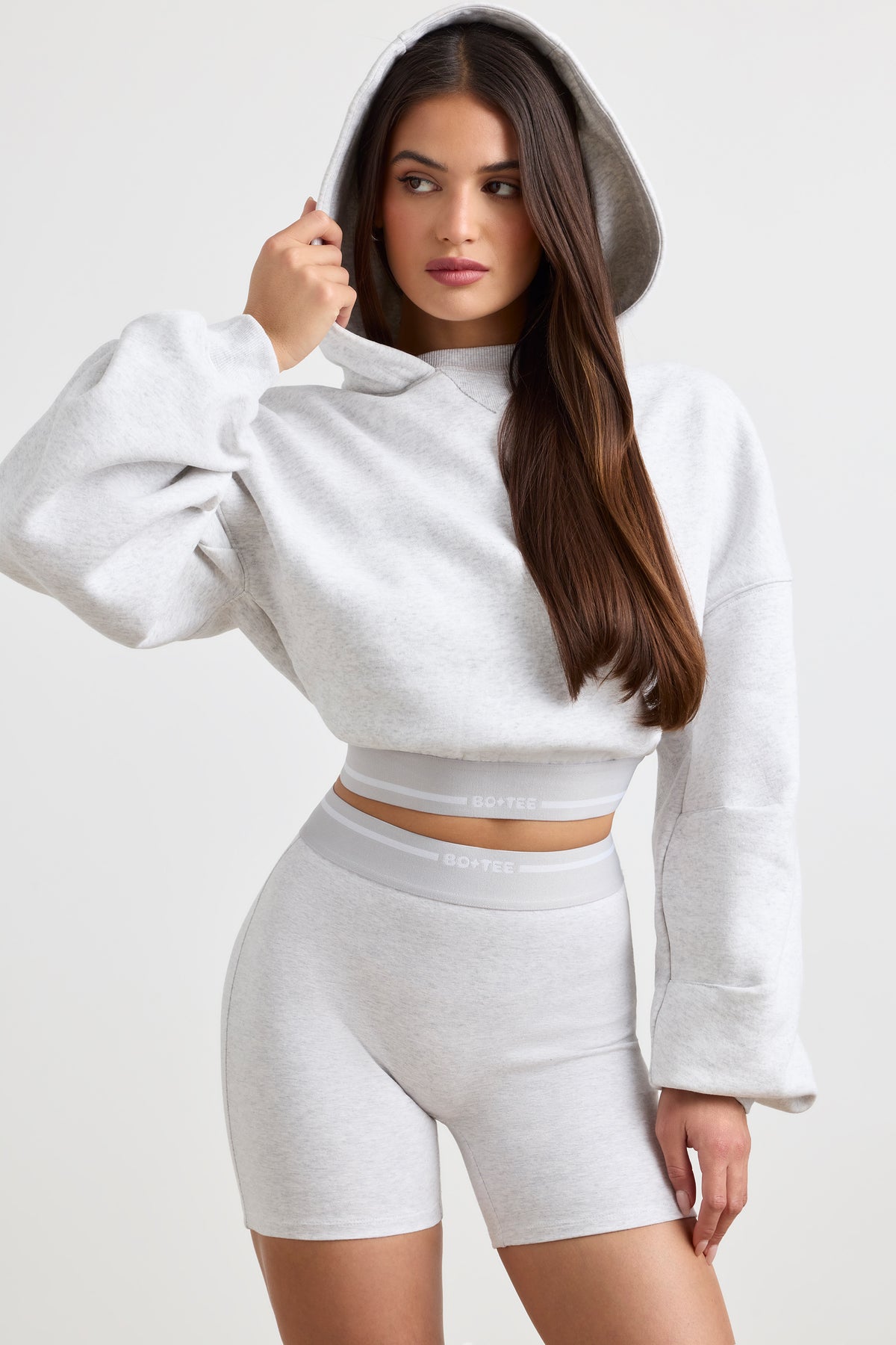 ⁣⁢Stretch-Baumwollfleece Cropped Hoodie in Grau meliert⁤⁣