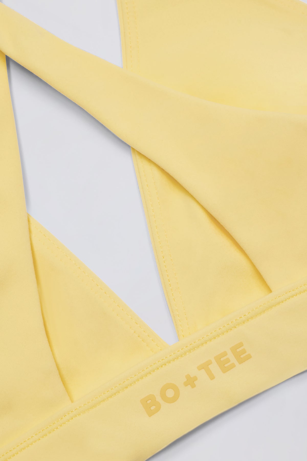 ⁣⁢Soft Active Sport-BH mit überkreuzten Trägern in Zitronengelb⁤⁣