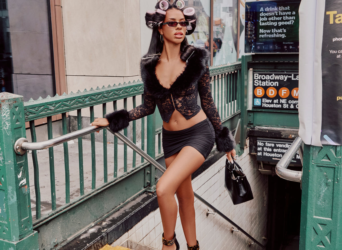 ⁣⁢Transparenter Cardigan mit Kunstfellbesatz in Schwarz⁤⁣ - 1