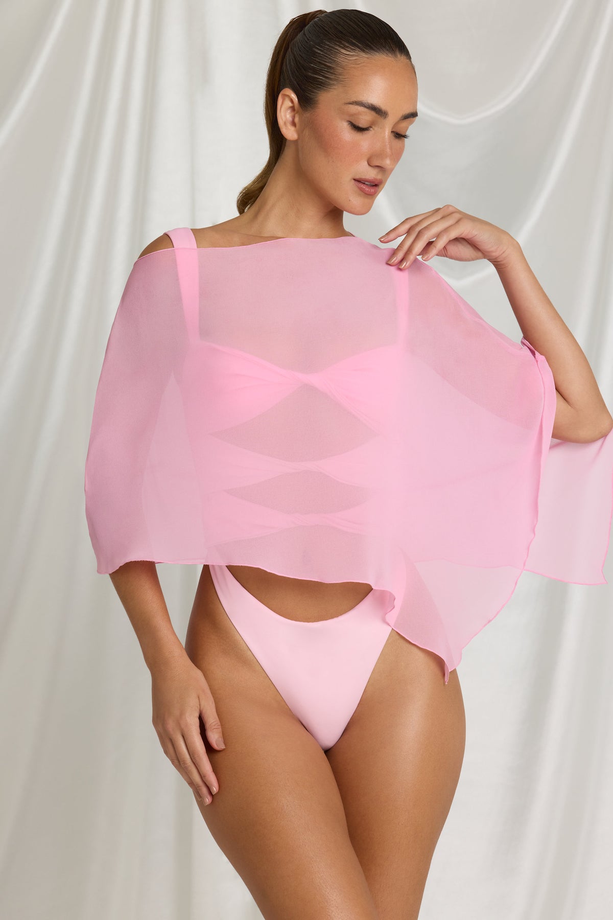 ⁣⁢Transparenter Poncho in Candyfloss Pink⁤⁣