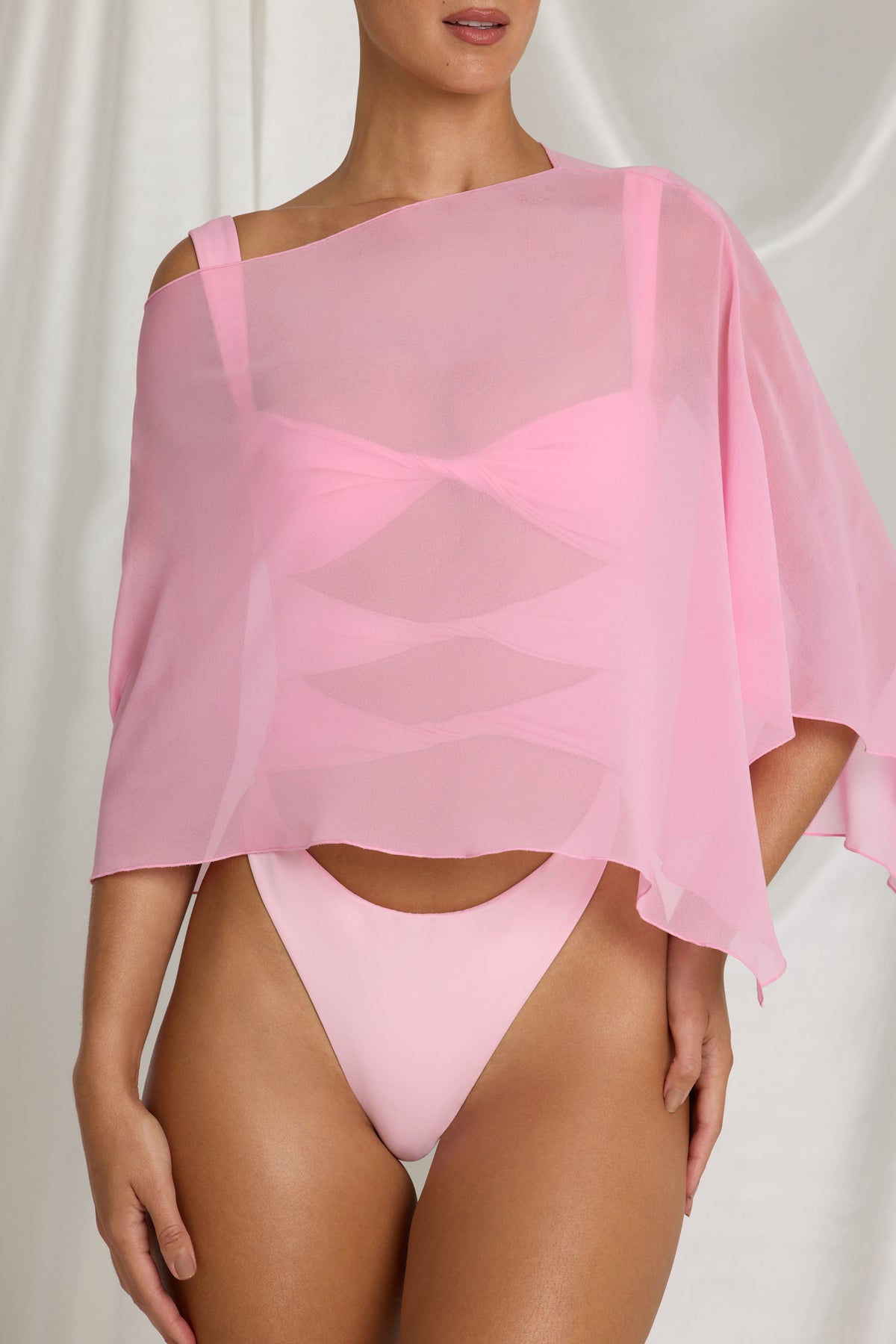 ⁣⁢Transparenter Poncho in Candyfloss Pink⁤⁣