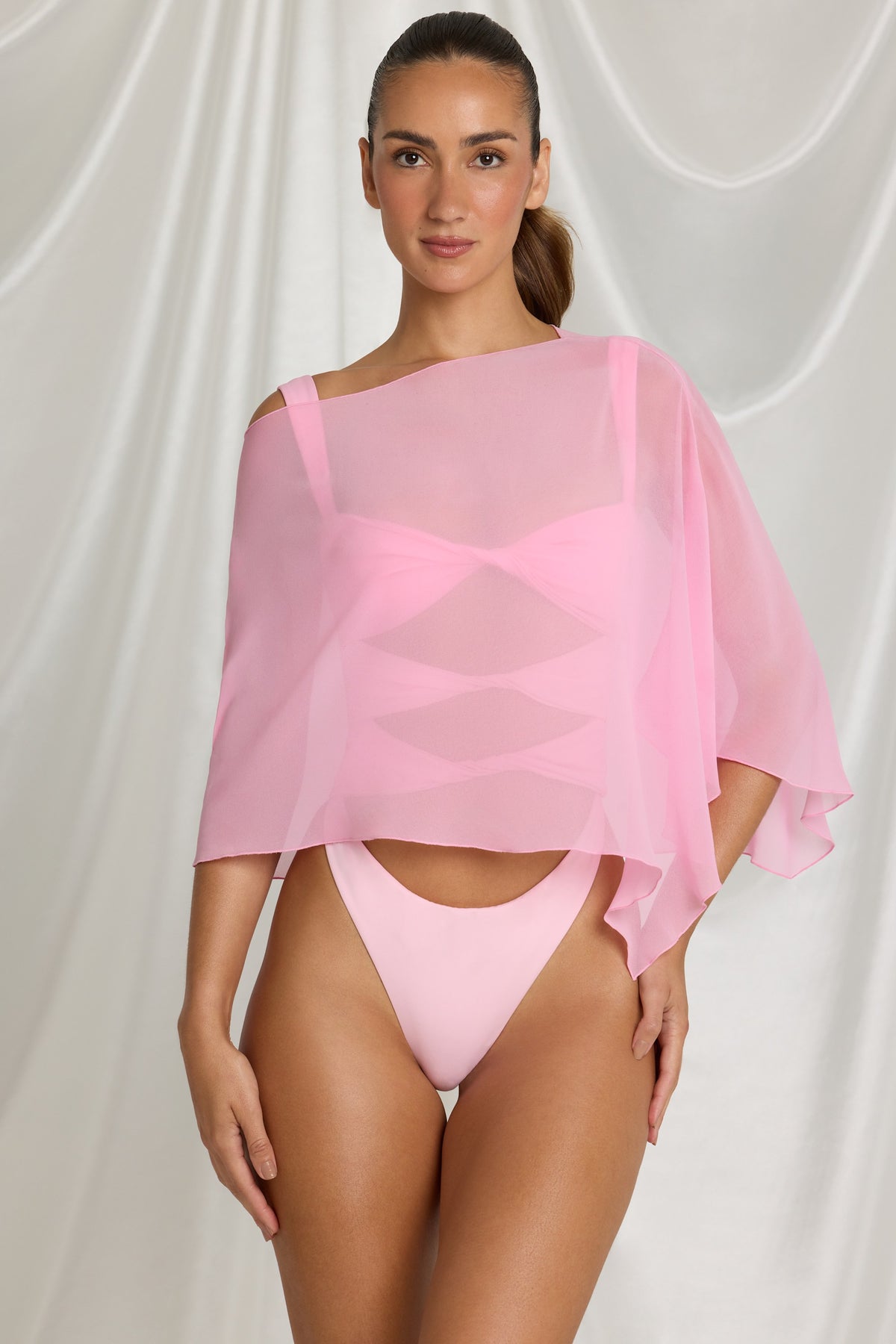 ⁣⁢Transparenter Poncho in Candyfloss Pink⁤⁣