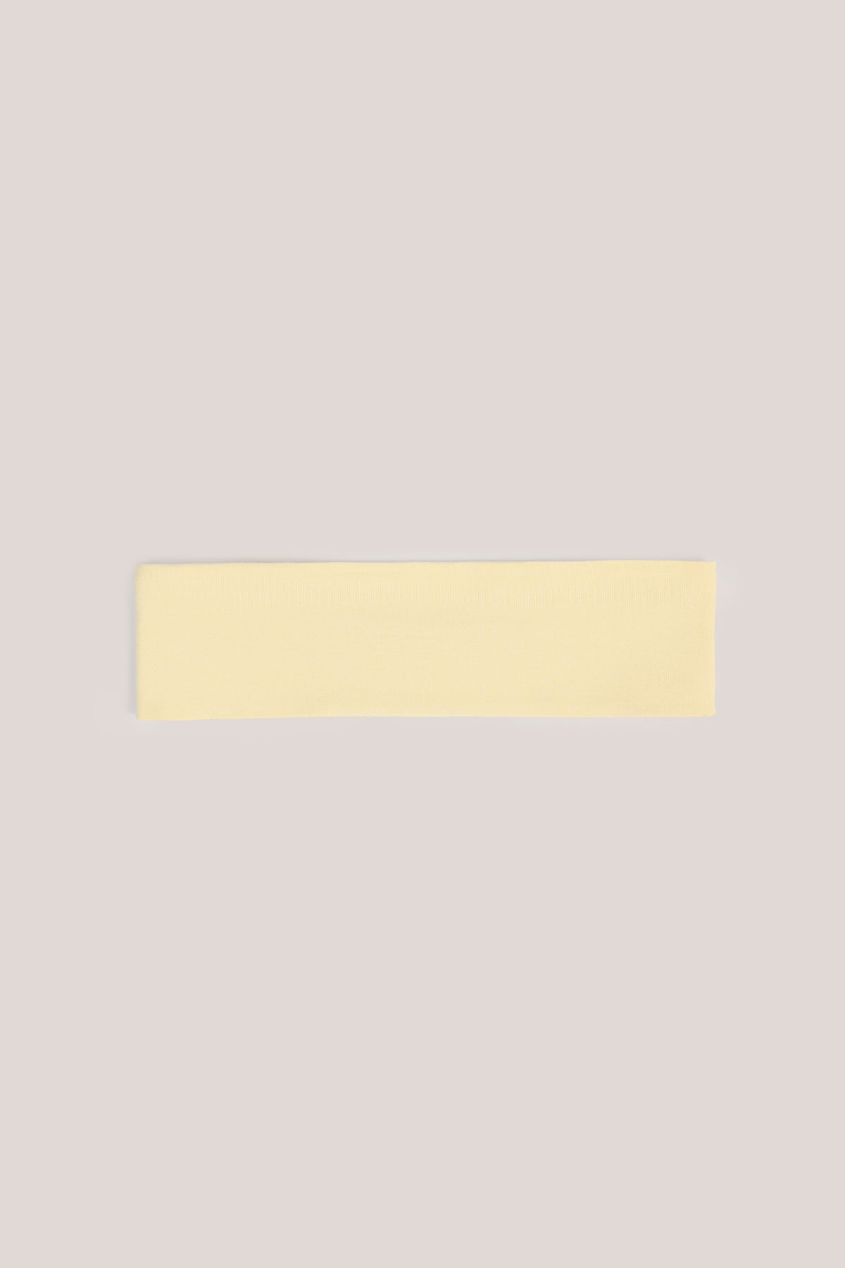 ⁣⁢Stirnband aus geripptem Modal in Buttercremegelb⁤⁣