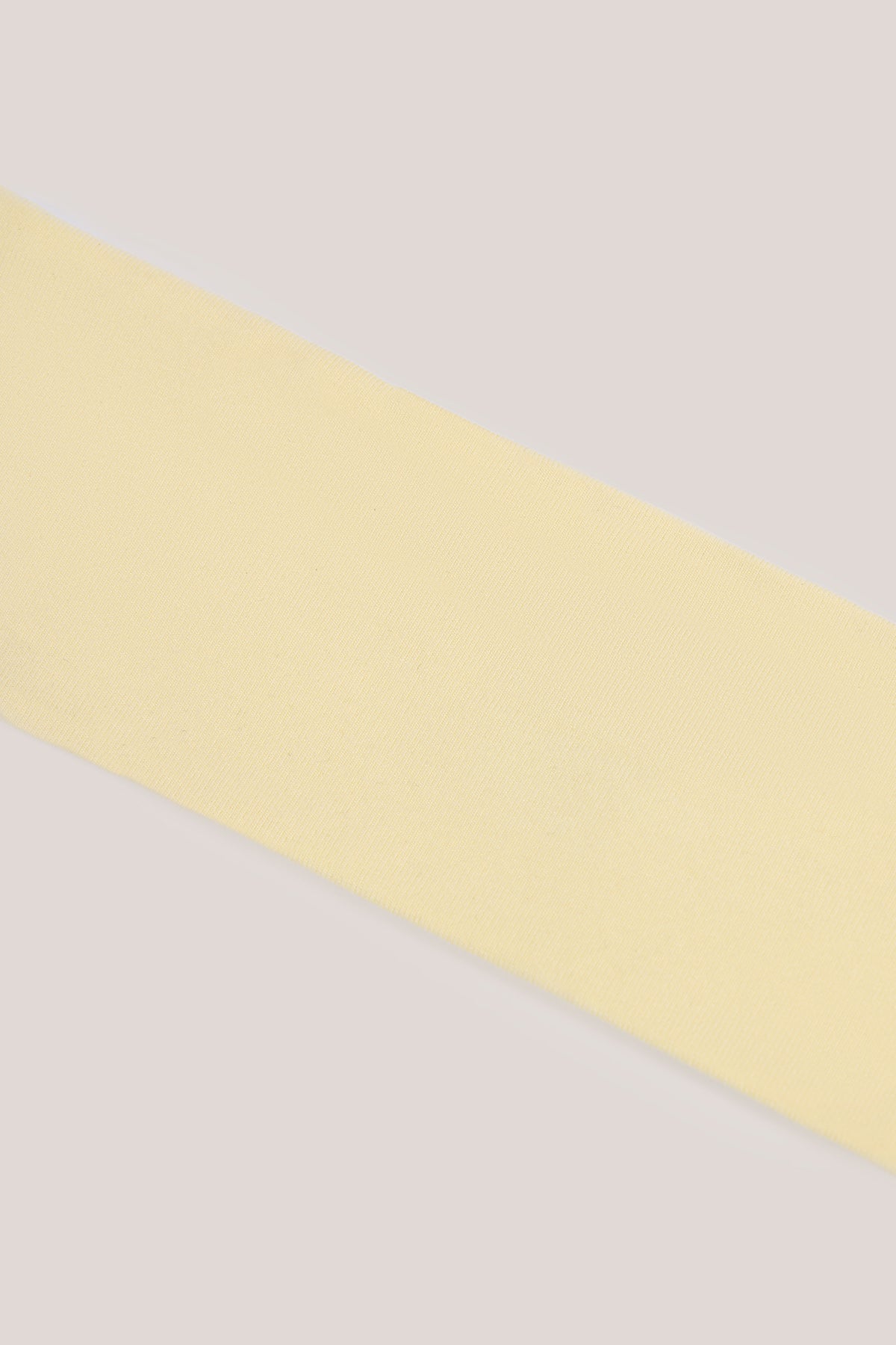 ⁣⁢Stirnband aus geripptem Modal in Buttercremegelb⁤⁣