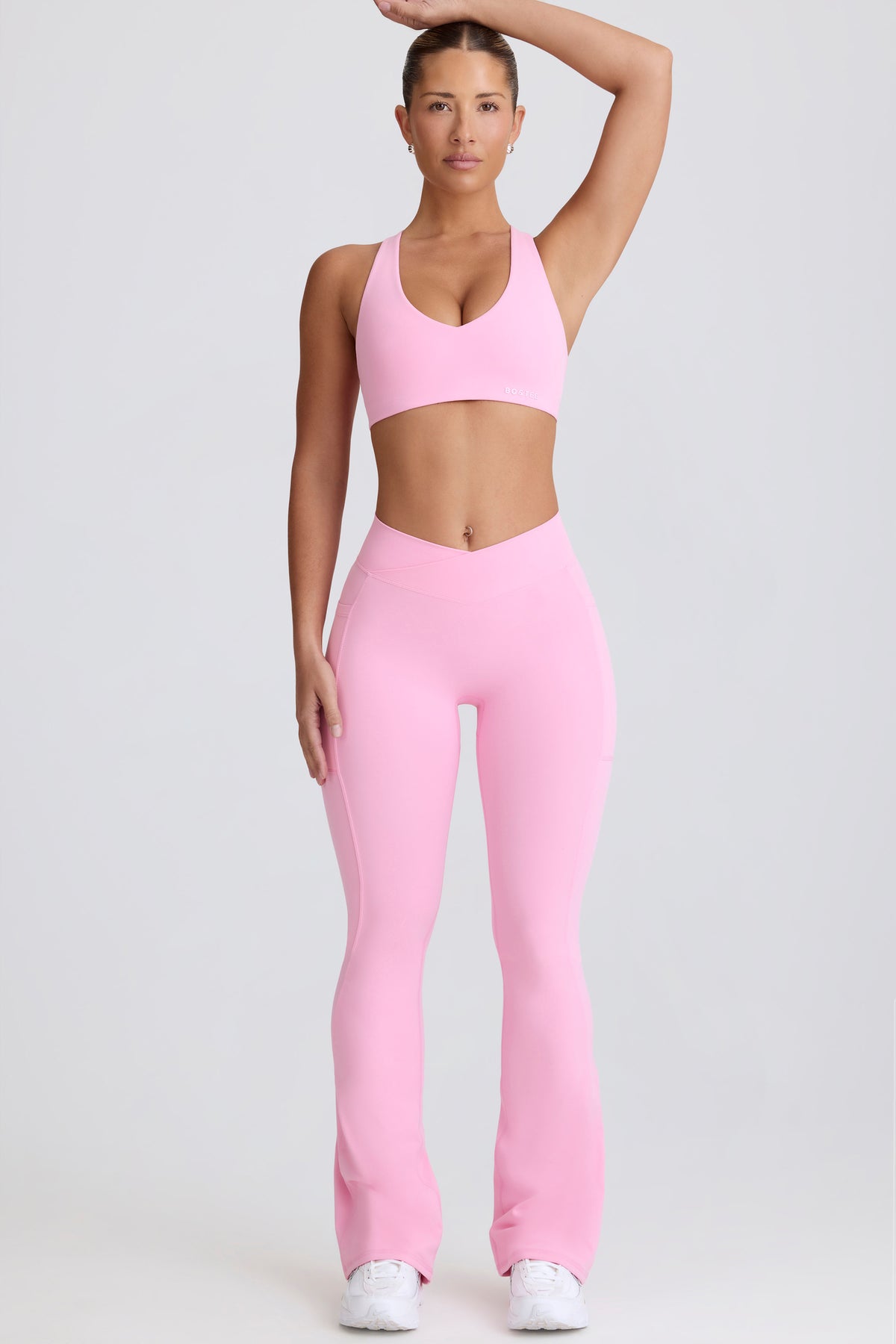 ⁣⁢Soft Active V-Waist Pocket Leggings mit ausgestelltem Bein in Baby Pink⁤⁣