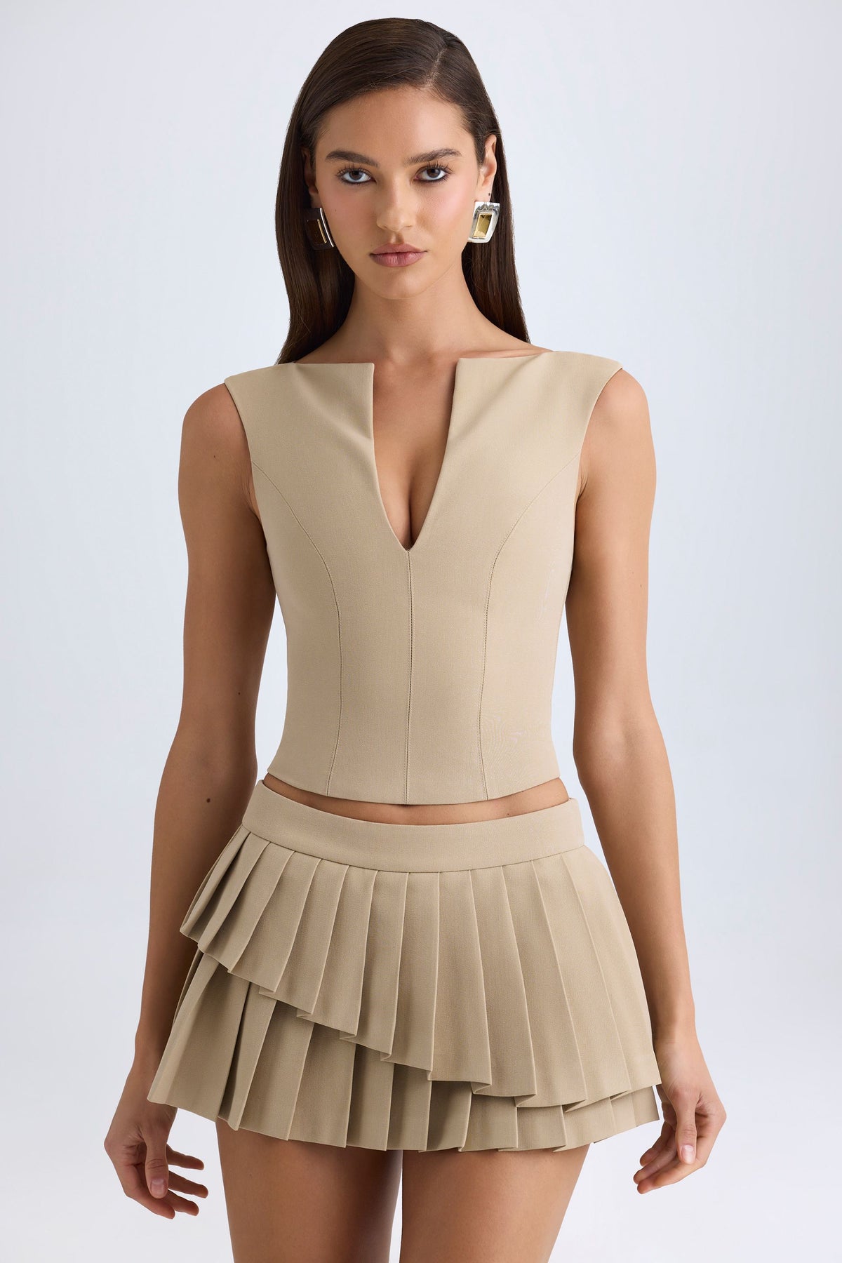 ⁣⁢Mehrlagiger plissierter Low-Waist-Minirock in Camel⁤⁣