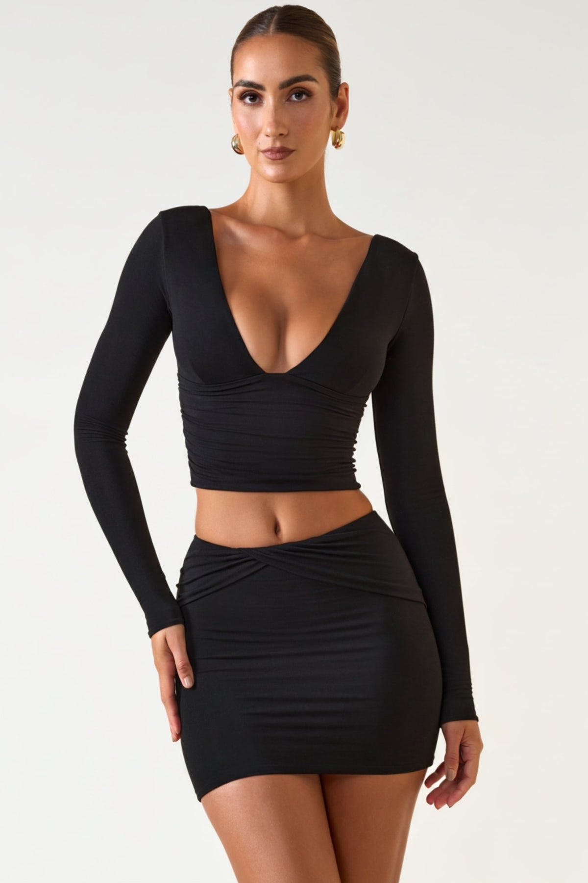 ⁣⁢Mid-Waist-Modal-Minirock mit Twist-Detail vorne in Schwarz⁤⁣