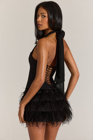 ⁣⁢Korsett-Minikleid aus Satin mit Federn in Schwarz⁤⁣