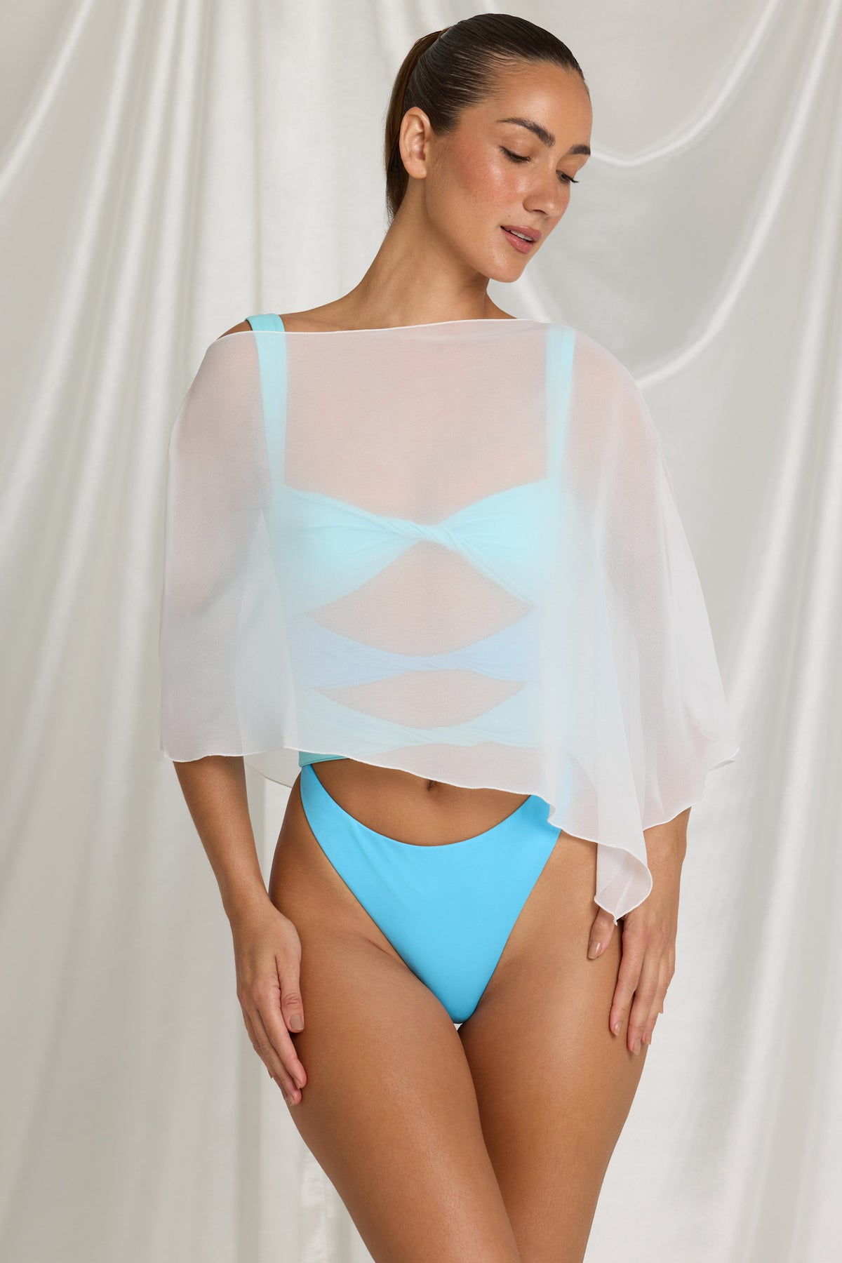 ⁣⁢Transparenter Poncho in Coconut⁤⁣