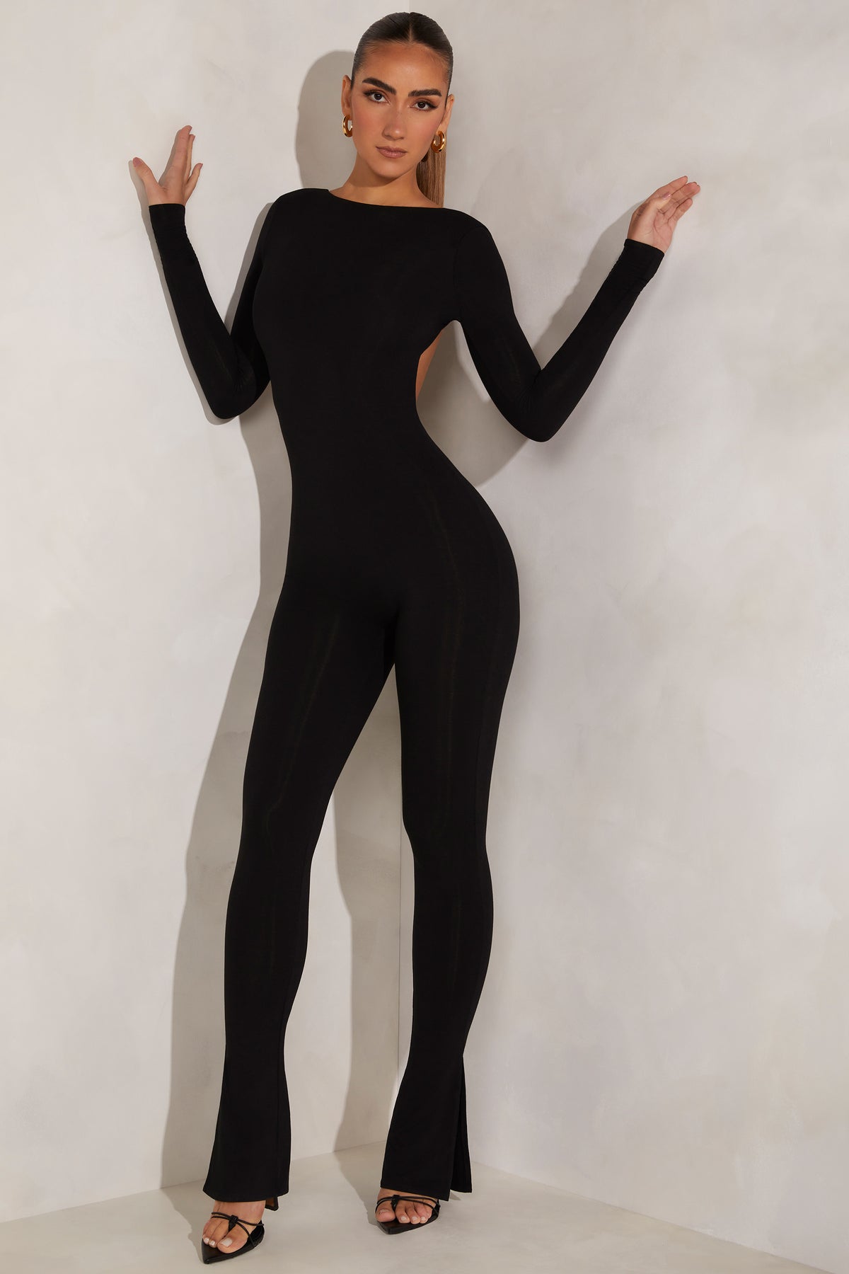 ⁣⁢Hochgeschlossener Jumpsuit mit Rückenausschnitt in Black⁤⁣ - 1